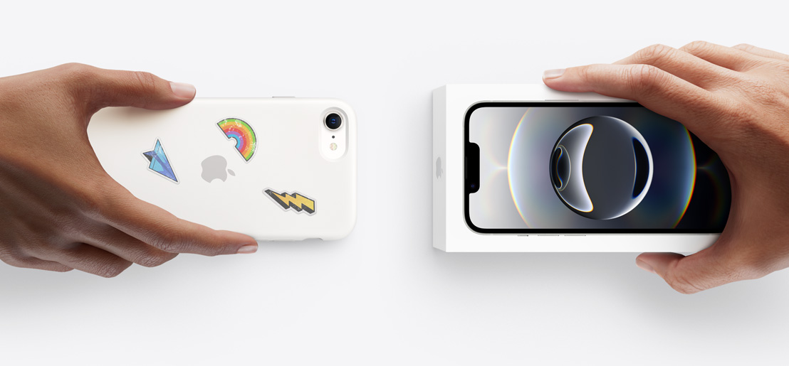 Hands exchanging trade-in Retail Delivery with Silicon cover, stickers on back exterior, for new PAYG Smart Meters in the box.